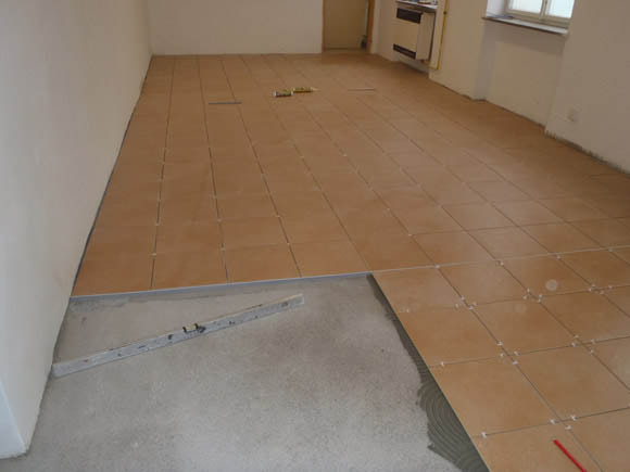 Oprava kuchyňky, podlahy pravého přísálí a vybudování chrániček pro budoucí elektrickou přípojku KD